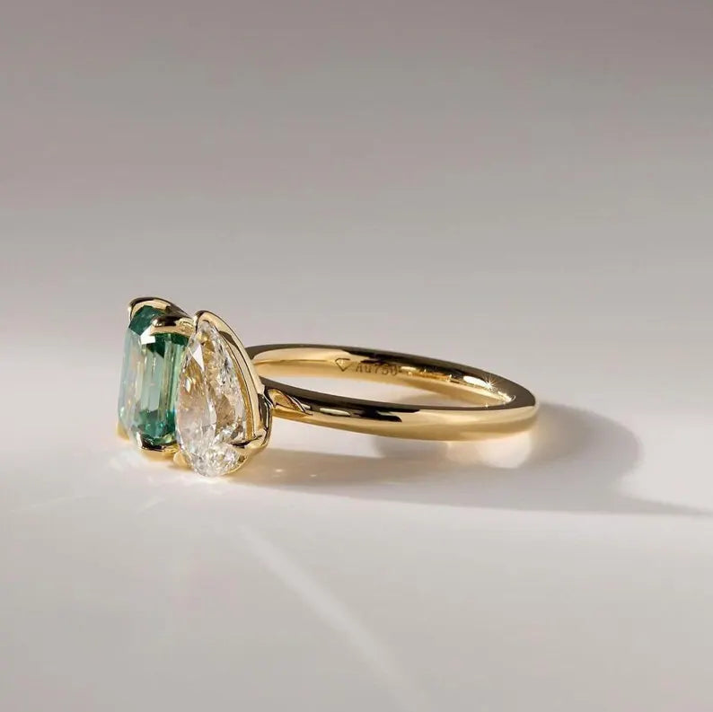 5.50 TCW Pear & Emerald Cut Green Moissanite Toi Et Moi Engagement & Wedding Ring in 14K Yellow Gold Finish