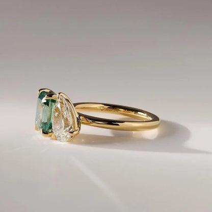 5.50 TCW Pear & Emerald Cut Green Moissanite Toi Et Moi Engagement & Wedding Ring in 14K Yellow Gold Finish