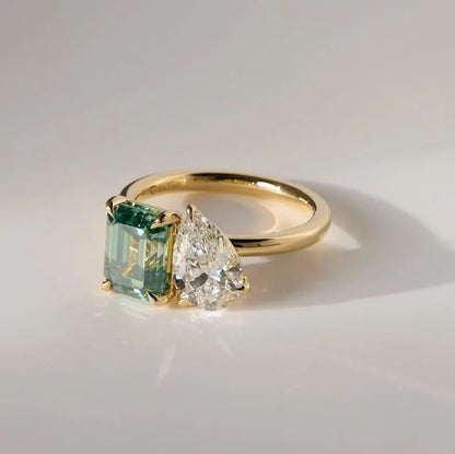 5.50 TCW Pear & Emerald Cut Green Moissanite Toi Et Moi Engagement & Wedding Ring in 14K Yellow Gold Finish