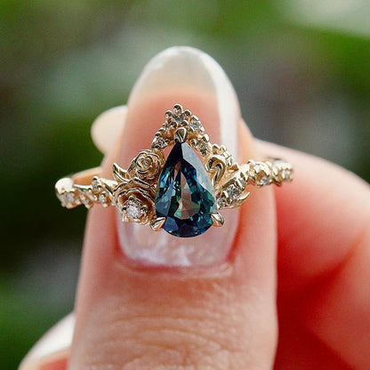 Pear Cut Teal Sapphire Blossom Rose & Dancing Swan Engagement Ring in 925 Sterling Silver